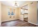 Inviting dining room featuring hardwood floors and an elegant chandelier at 4309 Enright Ct, Winter Park, FL 32792