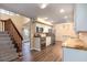 Open-concept kitchen featuring stainless steel appliances and granite countertops at 4309 Enright Ct, Winter Park, FL 32792