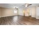 Spacious living room with ceiling fans and modern wood flooring at 4309 Enright Ct, Winter Park, FL 32792