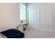 Bedroom featuring window with blinds, a storage cube, and a closet with paneled doors at 431 Scotsmans Pl, Debary, FL 32713