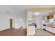 Bright kitchen featuring white cabinetry, tile flooring and neutral-colored countertops at 4801 Coachmans Dr # 2, Orlando, FL 32812