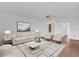 Bright living room with tile floors, ceiling fan, and neutral walls for versatile decorating at 4801 Coachmans Dr # 2, Orlando, FL 32812