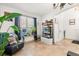 Bright living room with tile flooring, neutral walls, and lots of natural light from the large windows at 5361 Tortuga Dr, Orlando, FL 32837