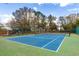 A community playground and tennis court offer recreational activities for all ages at 644 Strihal Loop, Oakland, FL 34787