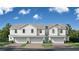 Charming new construction townhomes featuring bright exteriors, two-car garages and craftsman-style architecture at 6689 Horseshoe Lane Way, St Cloud, FL 34773