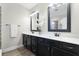 Bathroom with double sink vanity and matching mirrors at 696 Orange Belt Loop, Winter Garden, FL 34787