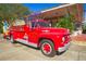 An antique Winter Garden Fire Department firetruck sits in front of the historic train depot at 696 Orange Belt Loop, Winter Garden, FL 34787