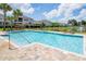 A community pool offers residents a refreshing retreat with ample deck space and lounge chairs at 696 Orange Belt Loop, Winter Garden, FL 34787