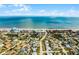 Breathtaking aerial view of a coastal community with a stunning beachfront and beautifully landscaped residential area at 815 Ocean Shore Blvd # U7A, Ormond Beach, FL 32176