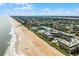 Beautiful aerial view of the condos, beach and ocean at 815 Ocean Shore Blvd # U7A, Ormond Beach, FL 32176