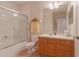 Well-maintained bathroom featuring a vanity, toilet, and shower-tub combination at 8168 Boat Hook Loop # 707, Windermere, FL 34786