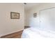 Cozy bedroom with wood-look floors and a closet with sliding doors at 8168 Boat Hook Loop # 707, Windermere, FL 34786