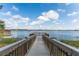 Scenic dock view with a view of the calm lake, showcasing the beautiful waterfront scenery and serene atmosphere at 8168 Boat Hook Loop # 707, Windermere, FL 34786