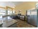 Outdoor kitchen area with stainless steel appliances and granite counters at 8168 Boat Hook Loop # 707, Windermere, FL 34786