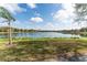 Stunning lake view with lush greenery, a serene setting for outdoor enjoyment and relaxation at 8168 Boat Hook Loop # 707, Windermere, FL 34786