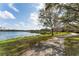 Scenic lake view with a walking path, ideal for nature walks and enjoying the peaceful surroundings at 8168 Boat Hook Loop # 707, Windermere, FL 34786