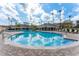 Inviting community pool featuring ample seating and covered lounging areas at 8168 Boat Hook Loop # 707, Windermere, FL 34786