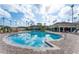 Beautiful community pool with lounge seating and clear blue water at 8168 Boat Hook Loop # 707, Windermere, FL 34786