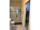 Bathroom featuring a glass enclosed shower at 8237 Serenity Spring Dr # 2605, Windermere, FL 34786