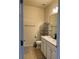 This bathroom features a double vanity, toilet, and a towel rack at 8237 Serenity Spring Dr # 2605, Windermere, FL 34786