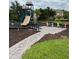 Community playground with slide and climbing wall at 8237 Serenity Spring Dr # 2605, Windermere, FL 34786