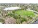 Aerial view of sports park featuring lakes, a soccer field and walking trails at 832 Westshore Ct, Casselberry, FL 32707