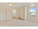 Bright bedroom featuring neutral walls, carpet, and a window allowing natural light at 832 Westshore Ct, Casselberry, FL 32707