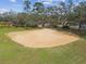 Aerial view of a well maintained baseball field with trimmed grass and maintained sand at 104 E Cottesmore Cir, Longwood, FL 32779