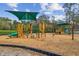 A colorful playground in the community park, perfect for children to enjoy outdoor activities at 104 E Cottesmore Cir, Longwood, FL 32779