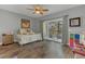 Bedroom featuring sliding glass doors to balcony with view at 10509 Belfry Cir, Orlando, FL 32832