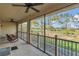 Screened patio features tile flooring and an incredible view of the golf course at 10509 Belfry Cir, Orlando, FL 32832