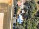 A top-down aerial view shows the layout of the property, buildings and surrounding landscaping at 111 Water Tank Rd, Haines City, FL 33844