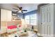 Virtually staged room with a bunk bed, storage and ceiling fan at 111 Water Tank Rd, Haines City, FL 33844