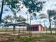 Outbuilding and shed construction with a rustic design with potential use for storage or workshop at 111 Water Tank Rd, Haines City, FL 33844