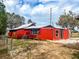 Exterior of home showcasing a functional addition and potential for outdoor enjoyment and expansion at 111 Water Tank Rd, Haines City, FL 33844