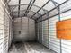 This spacious metal shed features a robust frame with clean lines and sturdy construction for versatile storage solutions at 111 Water Tank Rd, Haines City, FL 33844