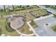 Aerial view of the community playground, garden, and common area for recreational opportunities at 11867 Pulitzer Pl, Orlando, FL 32832