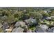 Expansive aerial view of property showcasing surrounding homes and mature trees at 1508 Delaney Ave, Orlando, FL 32806