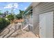 Back exterior shot showcasing a brick patio, rear entrance, and well-maintained landscaping at 1508 Delaney Ave, Orlando, FL 32806