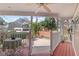 Covered porch with a dining set and a view of the backyard patio at 1508 Delaney Ave, Orlando, FL 32806