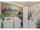 Convenient laundry room with modern washer and dryer at 1508 Delaney Ave, Orlando, FL 32806