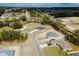 An aerial shot of three newly built single Gathering homes and the community around the neighborhood at 1633 Sw 168Th Loop, Ocala, FL 34473