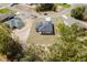 An aerial shot looking down at a single Gathering home with a dark roof and attractive neighborhood at 1633 Sw 168Th Loop, Ocala, FL 34473