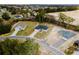 An aerial view of three single Gathering homes on individual lots showcasing the community at 1633 Sw 168Th Loop, Ocala, FL 34473