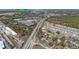 Aerial shot displays the community near a Publix for convenient shopping at 1703 Wynford Cir, Tavares, FL 32778