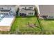 Aerial view of large, well-manicured backyard, featuring a fenced perimeter at 18339 Oliver Twist Way, Winter Garden, FL 34787