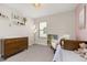 Light and airy Bedroom with modern light fixture and neutral tones at 18339 Oliver Twist Way, Winter Garden, FL 34787