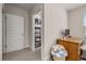 Cozy home office with organized closet space and a view at 18339 Oliver Twist Way, Winter Garden, FL 34787