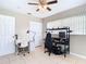 Bright bedroom with tiled floors, ceiling fan, and ample closet space at 23 Judith Ln, Orlando, FL 32811