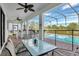 Beautiful screened-in pool area with ample seating, and a well-kept deck, great for relaxing at 2383 Victoria Dr, Davenport, FL 33837